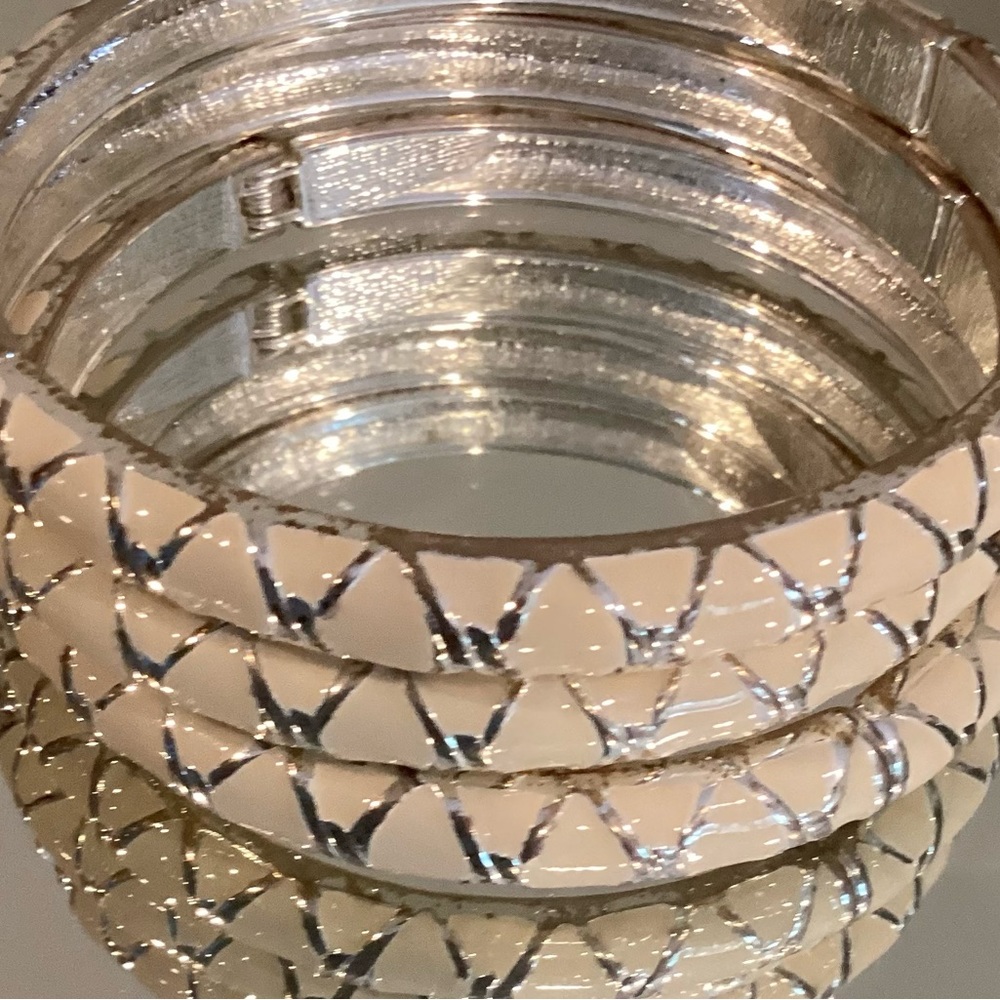 Stack of three on trend bracelets